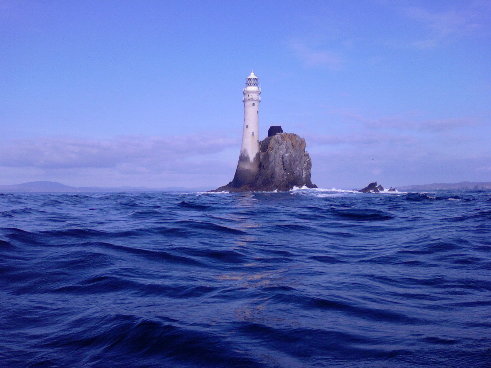 Fastnet Rock Lighthouse rising from a lone sea rock off County Cork