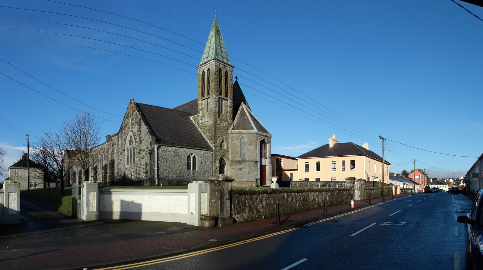 Stone church and road through the small Clare town of Lisdoonvarna