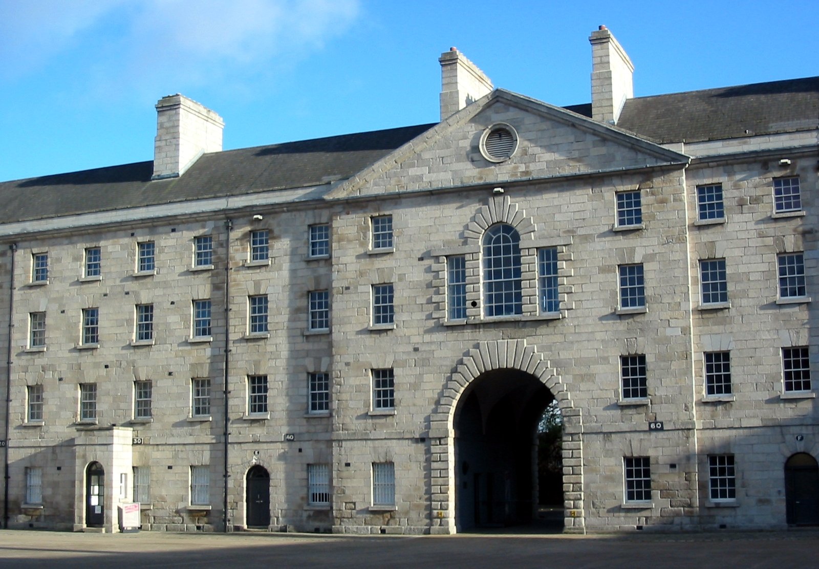 The stone facade and archway of Collins Barracks in Dublin