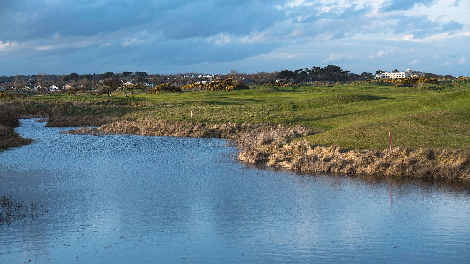 Portmarnock links fairways and greens by the water north of Dublin