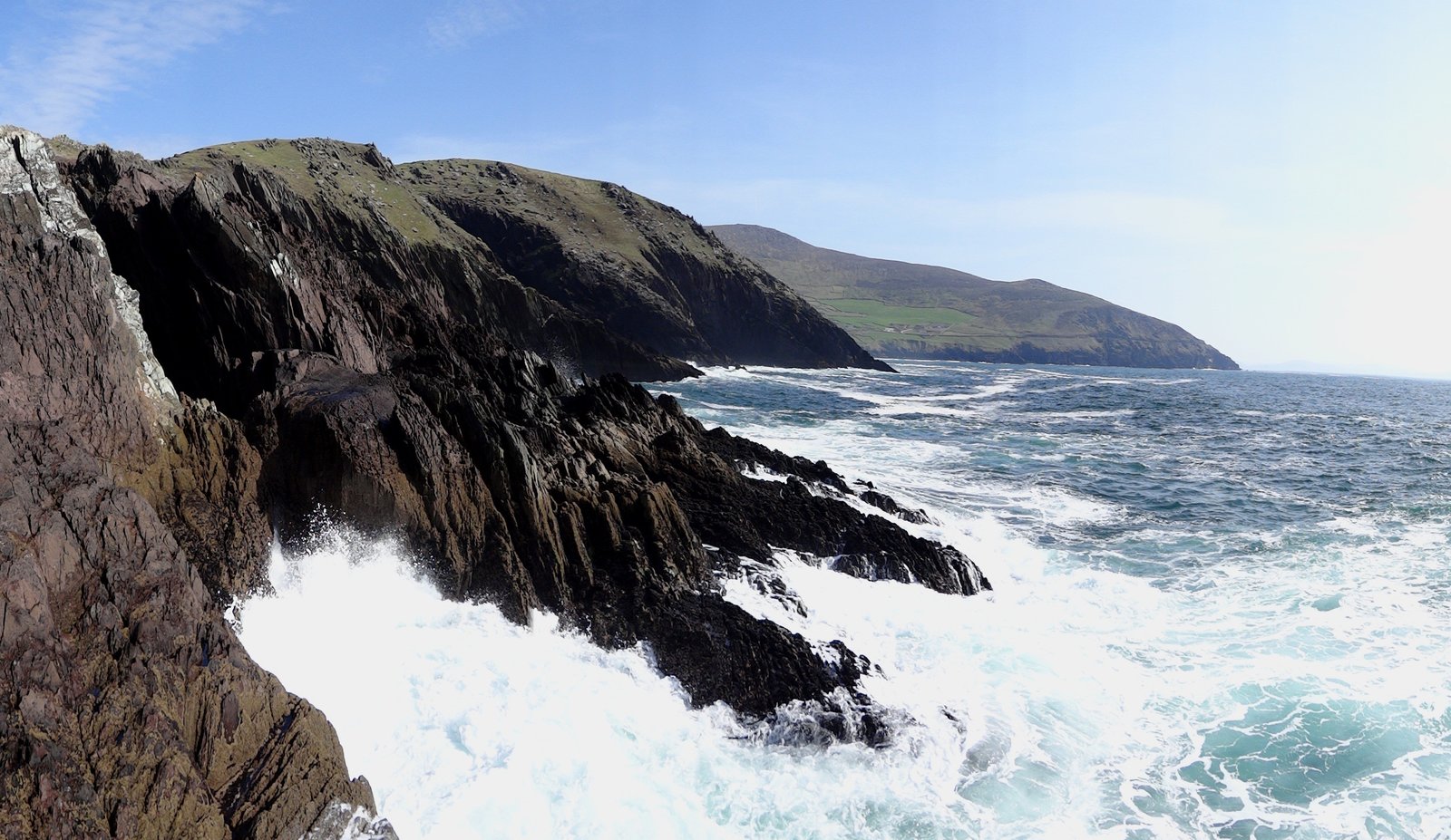 Sea cliffs and crashing waves on the Dingle Peninsula