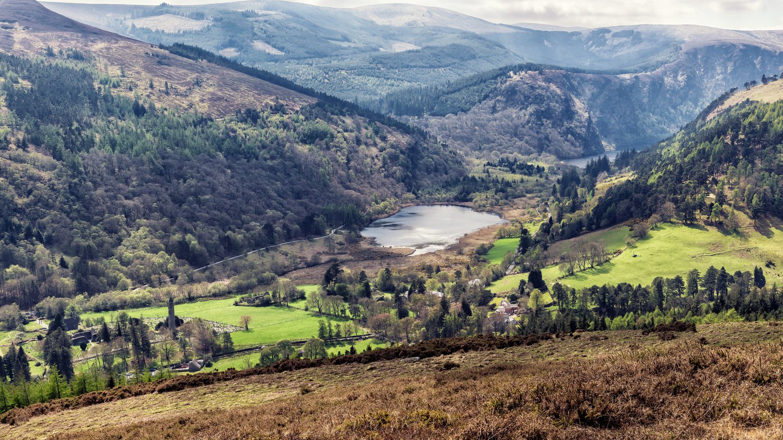 Glendalough lake and round tower in the Wicklow Mountains