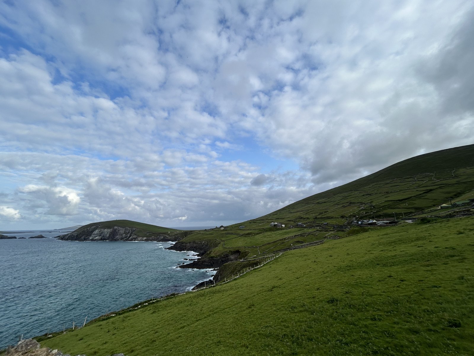 Green headland and Atlantic coast along the Slea Head Drive on the Dingle Peninsula.