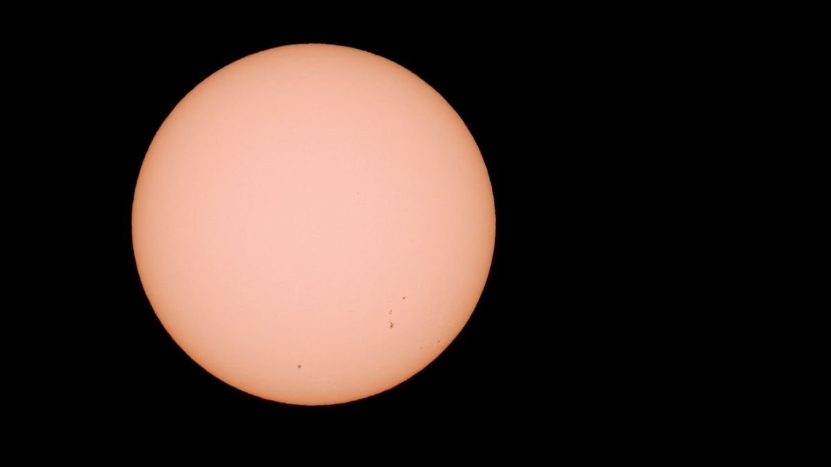The sun showing sunspots, source of solar activity