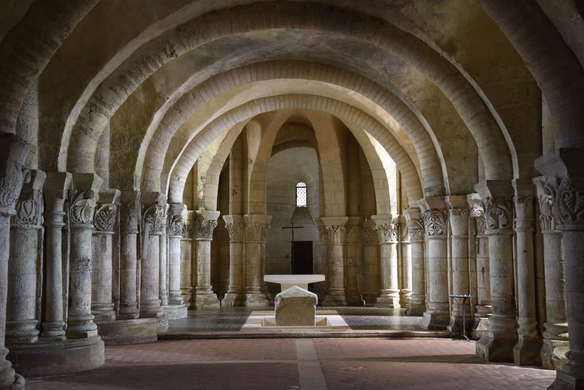 Vaulted stone church crypt with columns