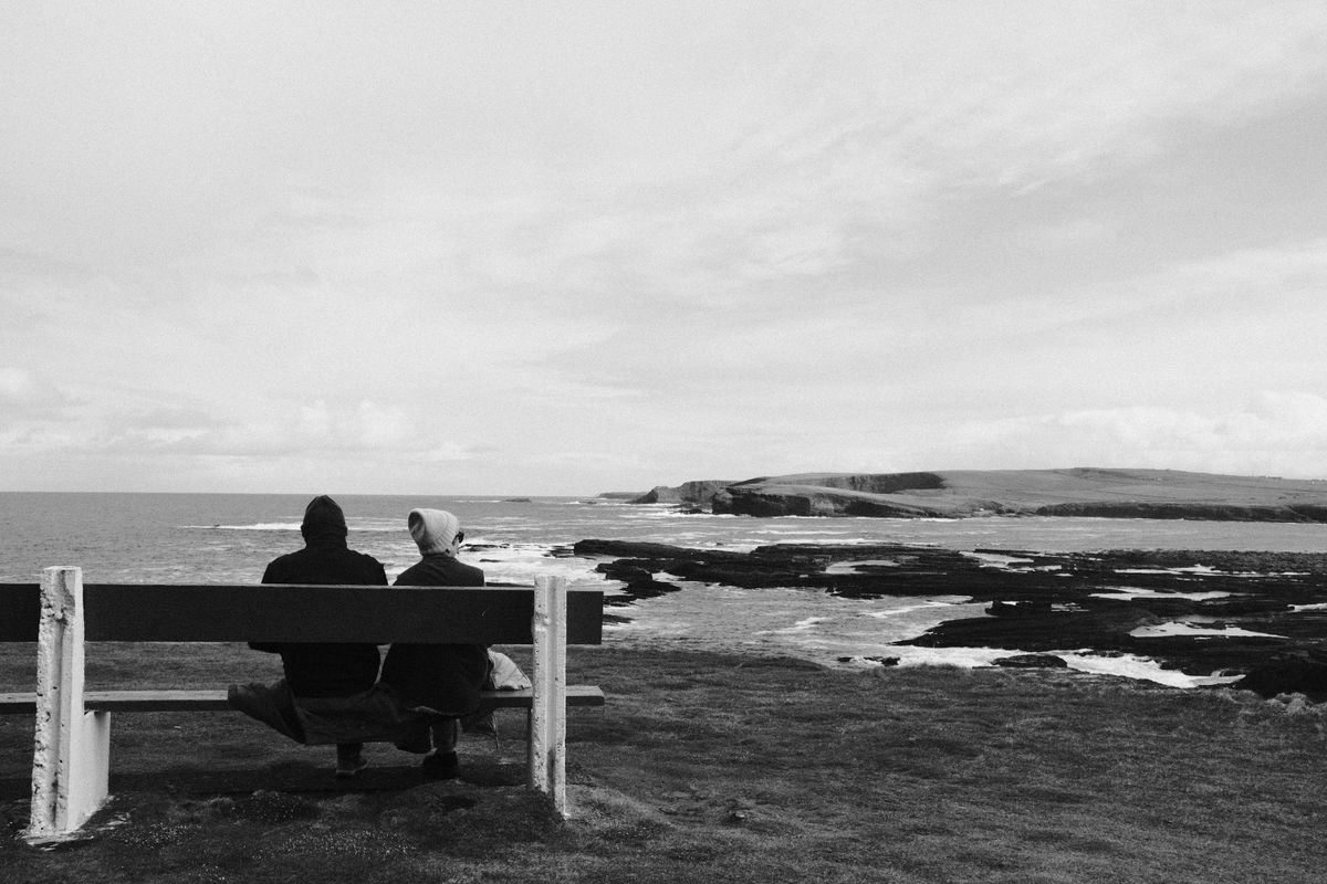 Couple on the Irish coast at the start of a 10-day Ireland honeymoon itinerary
