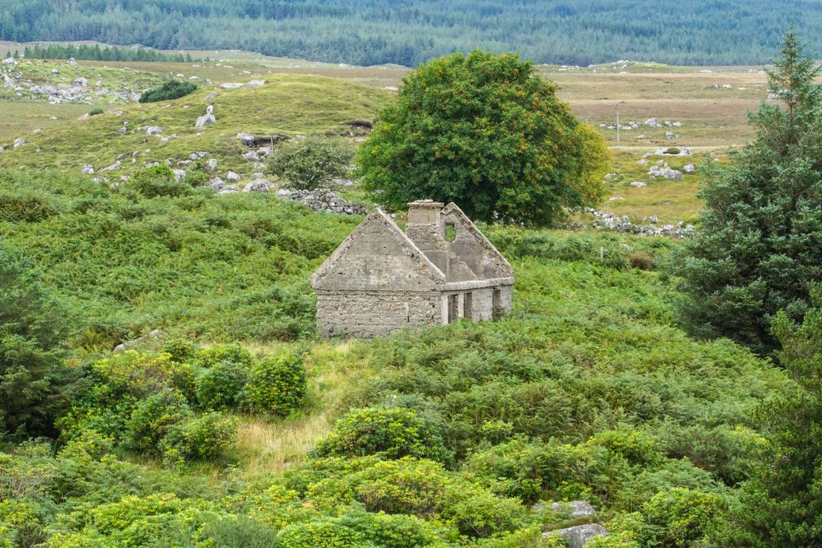 roofless stone cottage ruin on a hillside at Slievemore Achill