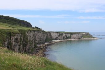 Dramatic Causeway Coast cliffs and sea in Northern Ireland