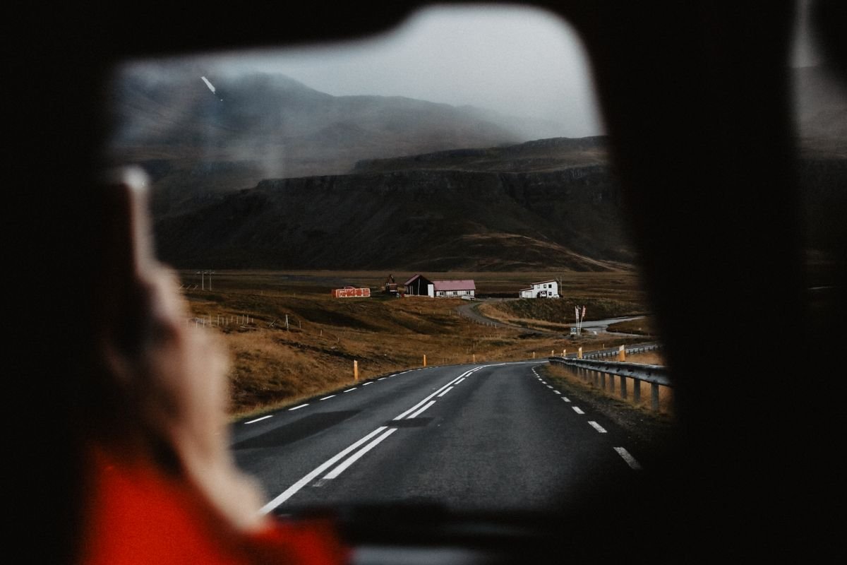 View out a car window at a country road on a private tour of Ireland