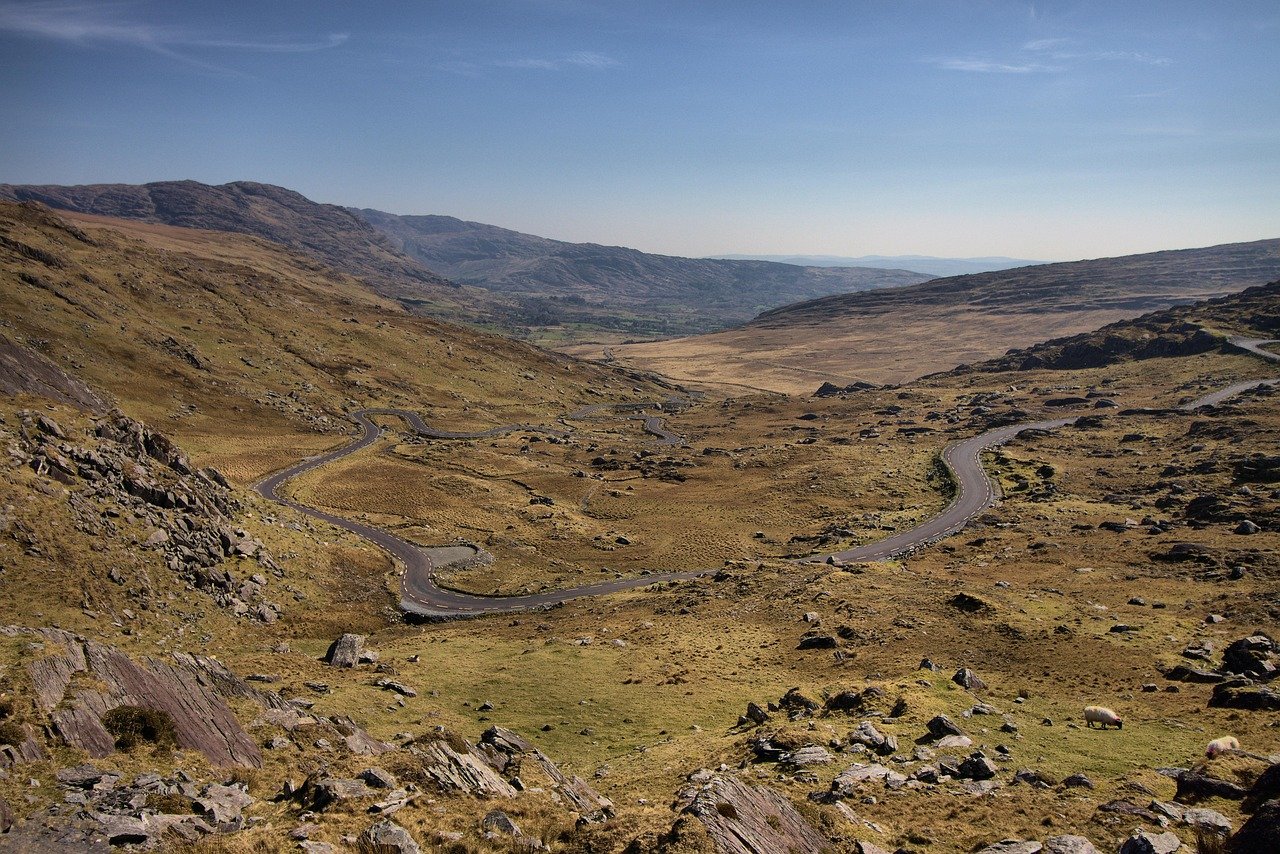 Winding mountain pass road through a valley on the Beara Peninsula
