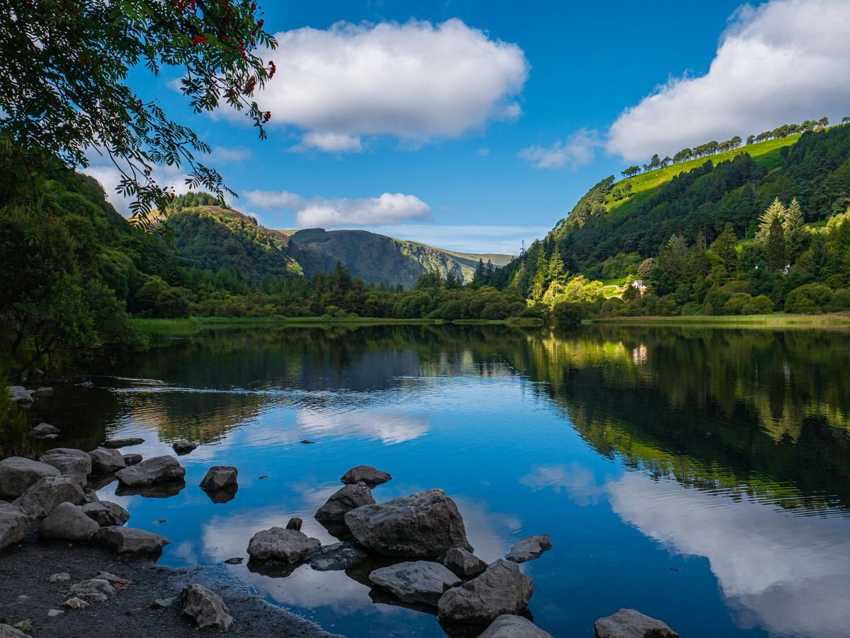 Glendalough lake with the Wicklow Mountains reflected in the water