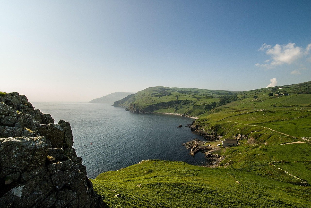 A wide panorama of the Antrim headland and bay