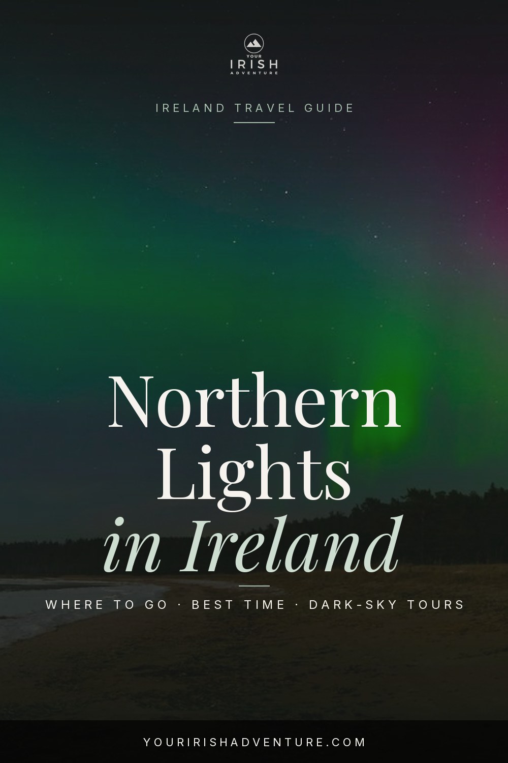 Green aurora over the dark coastline at Malin Head in Donegal Ireland at night