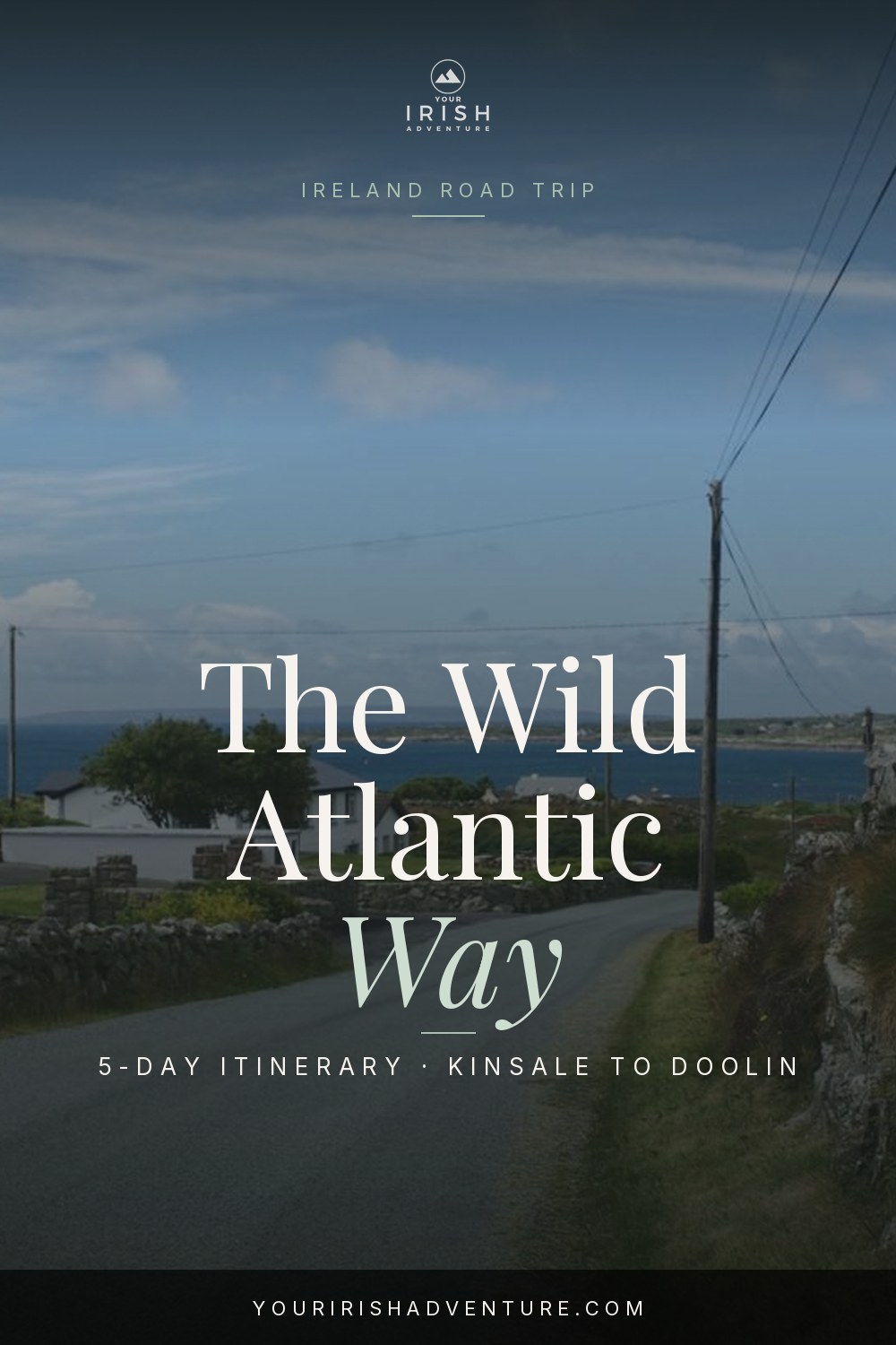 Coastal road curving along cliffs on Ireland's Wild Atlantic Way route from Kinsale to Doolin