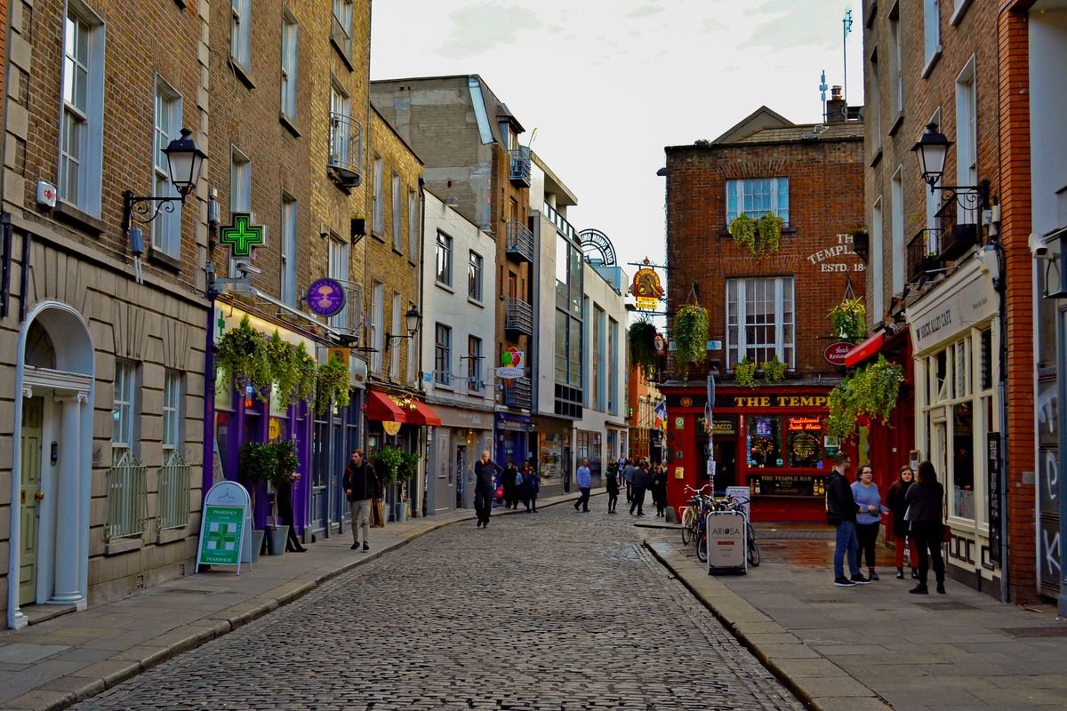 Cobbled Temple Bar street with the red Temple Bar pub on the corner