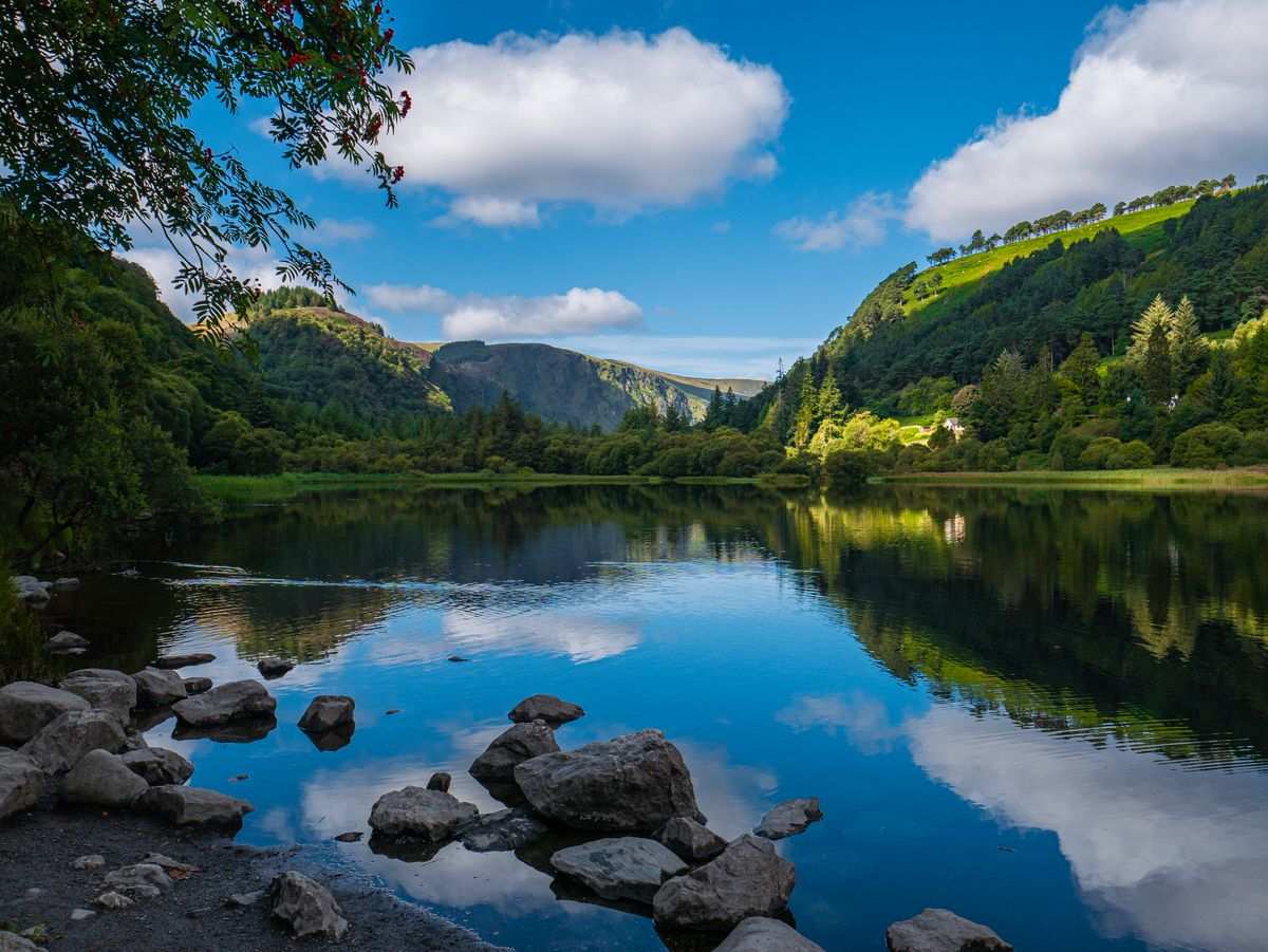 Glendalough's lake and wooded hills in the Wicklow Mountains, Leinster's easiest wild scenery from Dublin