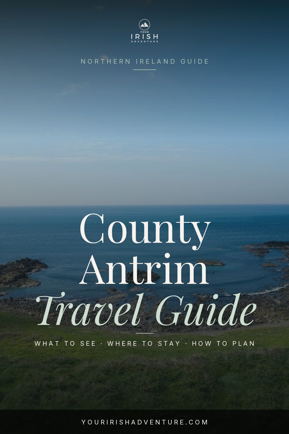 Basalt columns and green coastline of County Antrim in Northern Ireland