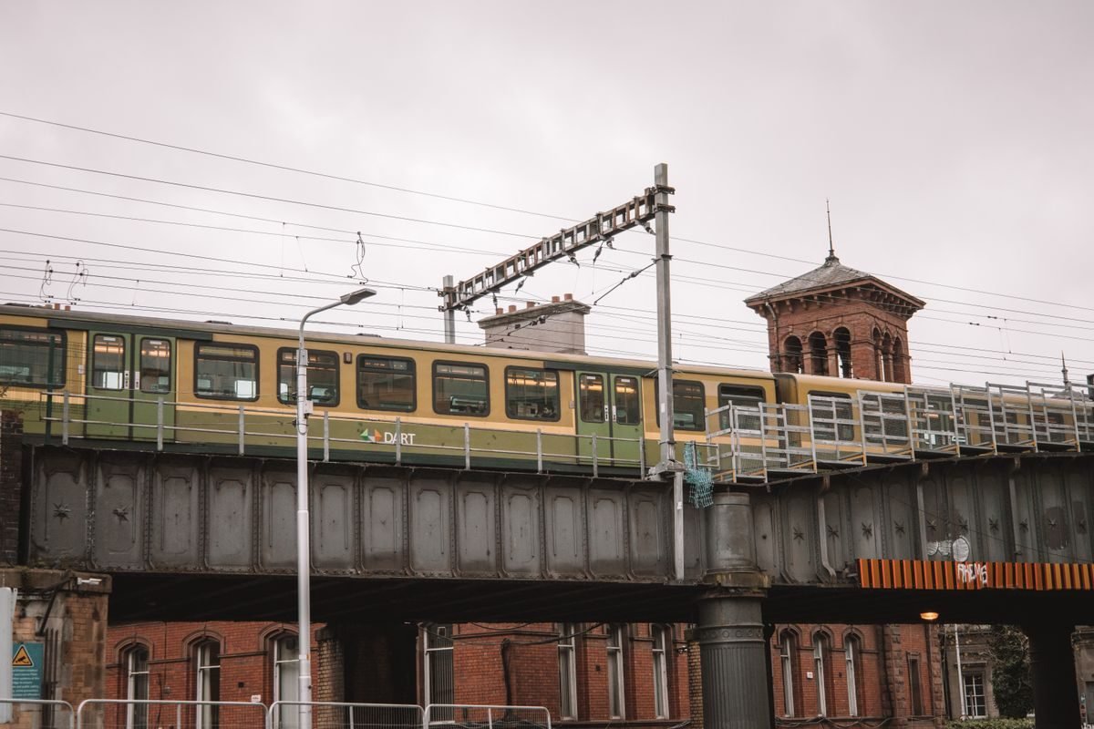 An Irish Rail train crossing a viaduct
