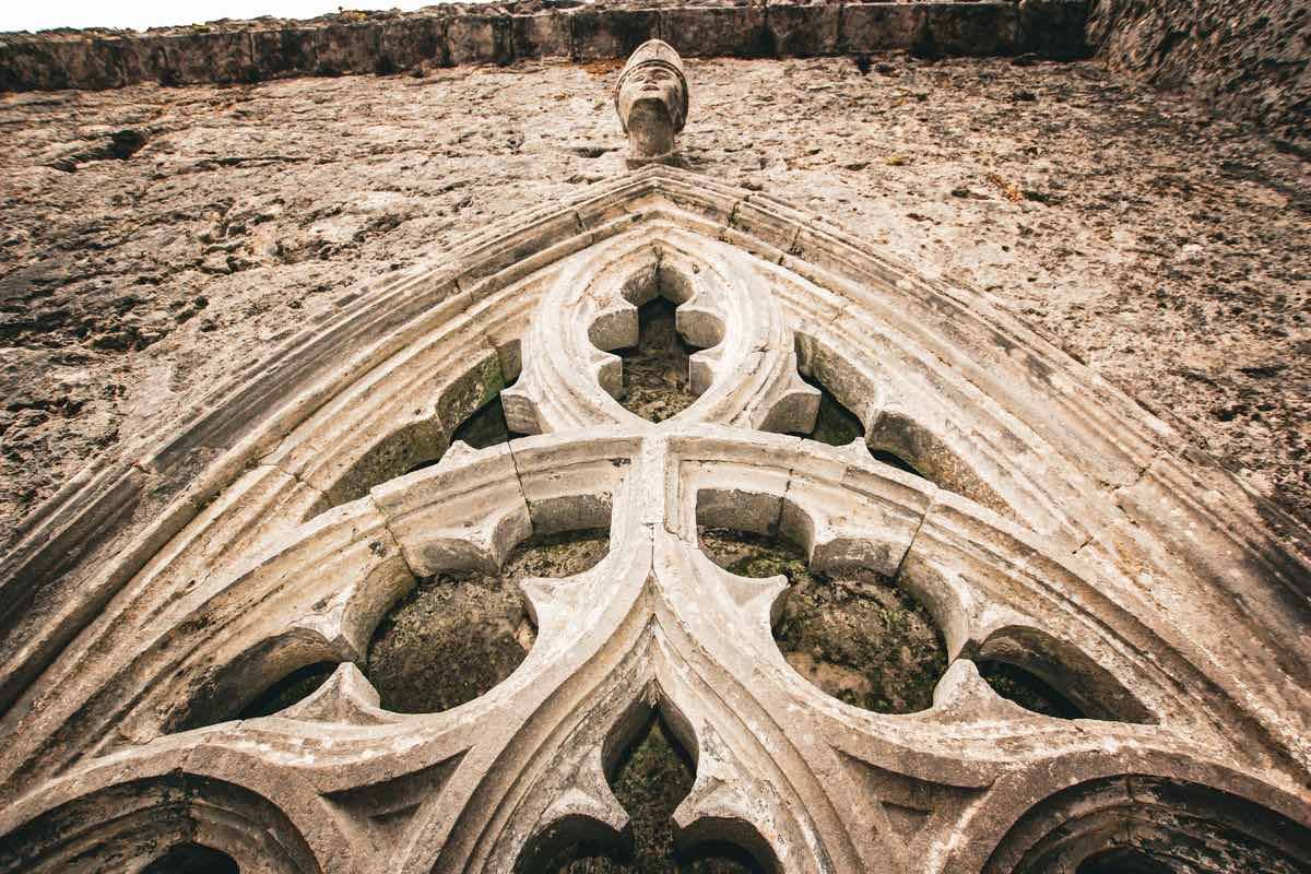 A carved medieval stone front with Gothic tracery, like the best-preserved stonework in Galway City