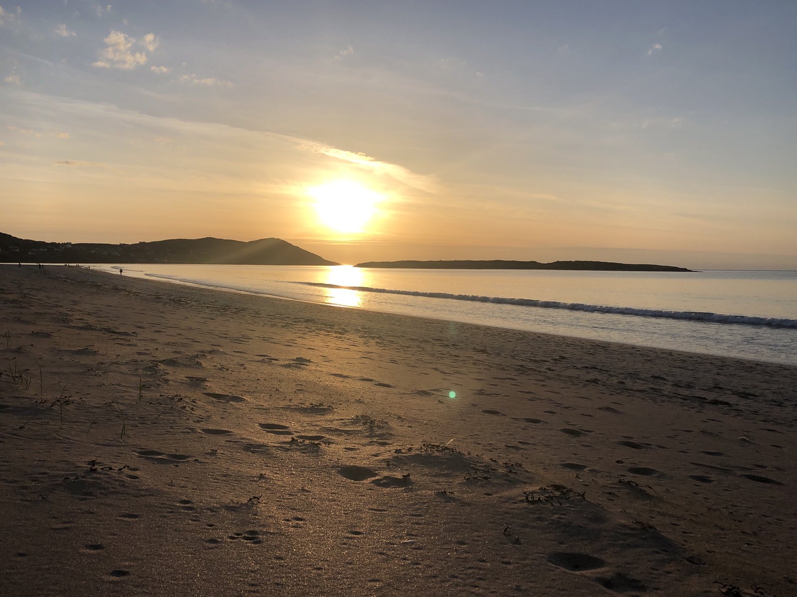 Wide sandy Narin beach near Portnoo at sunset, County Donegal