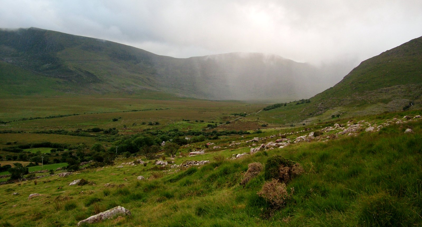 The narrow Conor Pass road climbing through the mountains above Dingle