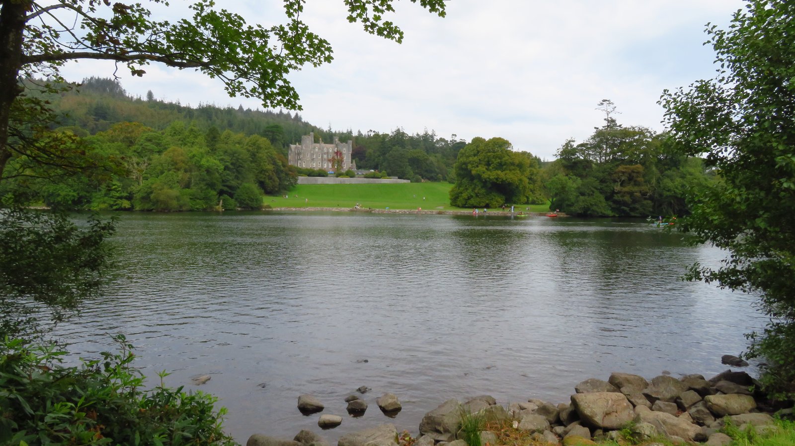 Castlewellan Castle seen across the lake in Castlewellan Forest Park