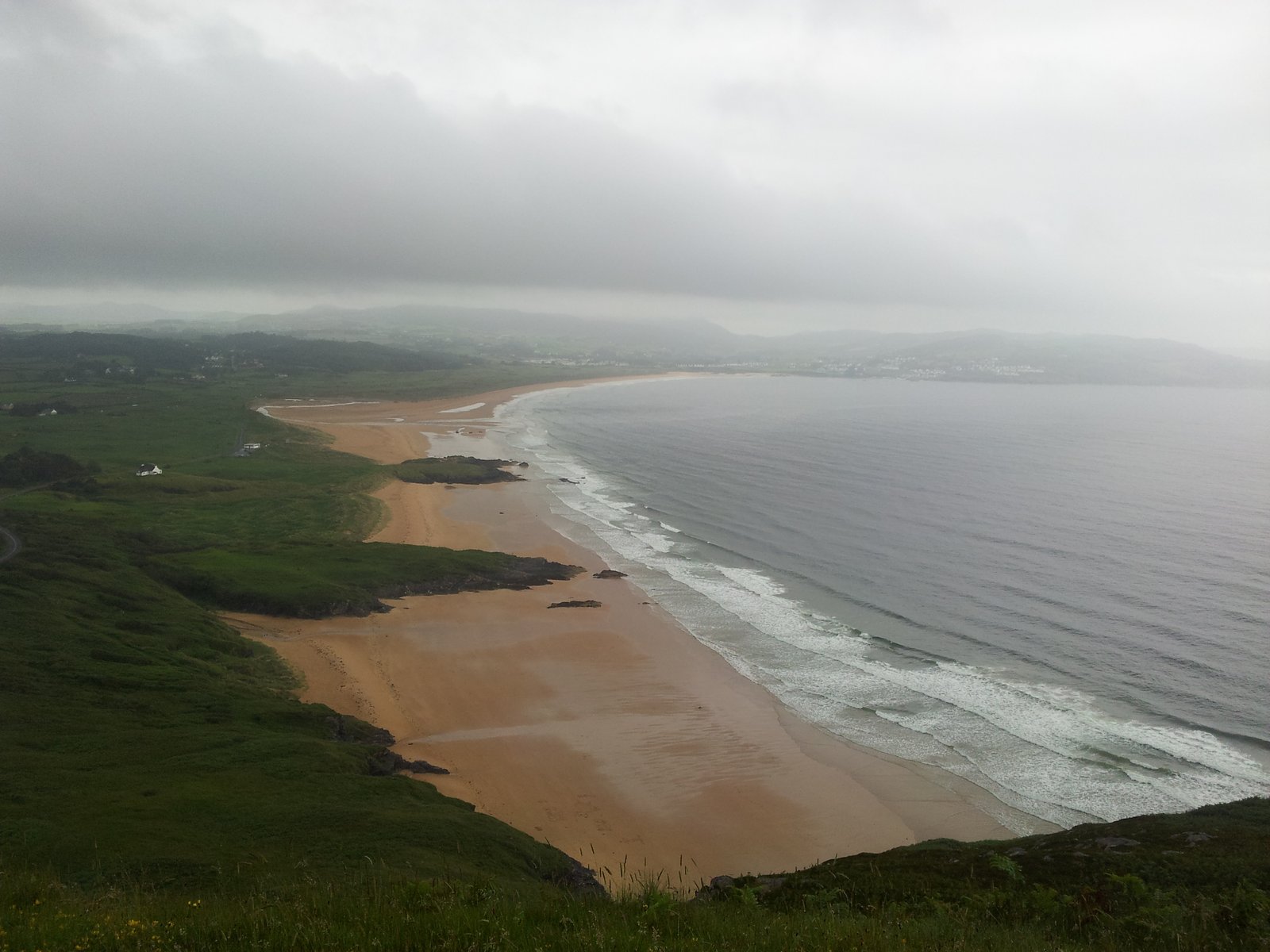 Golden sand sweep of Ballymastocker Bay at Portsalon, County Donegal