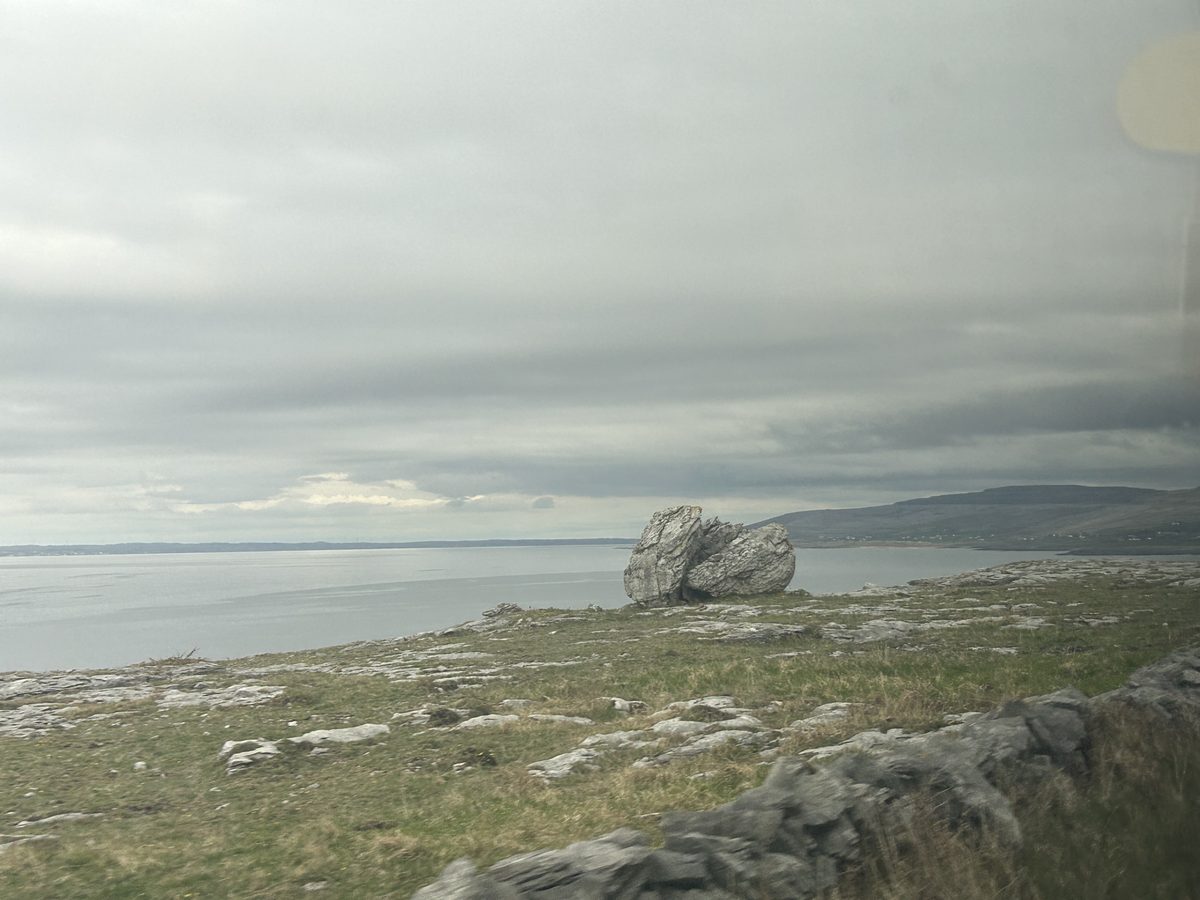A large glacial erratic boulder on the Burren coast above the Atlantic