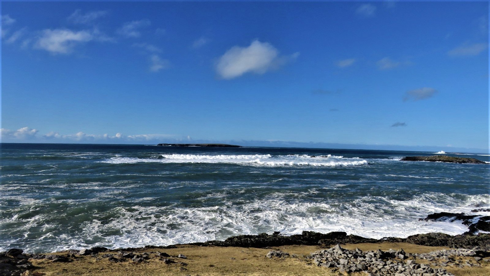 A rocky headland and surf on the Dingle Peninsula coast