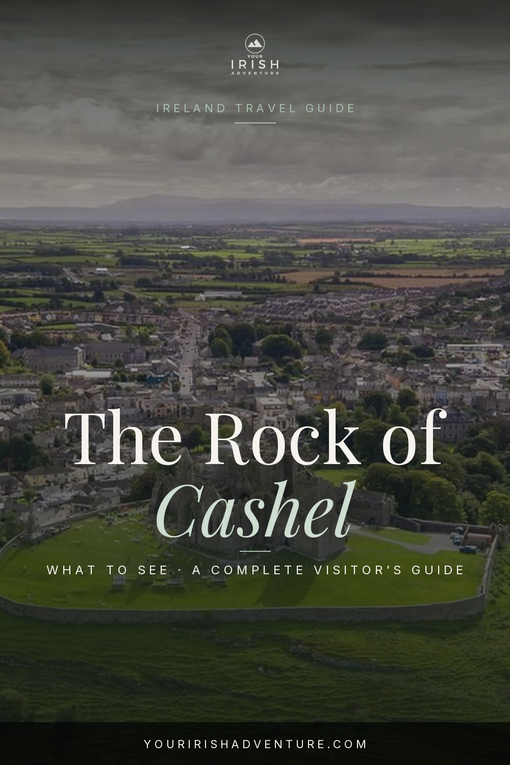 The Rock of Cashel round tower and cathedral ruins on a green hill in County Tipperary Ireland