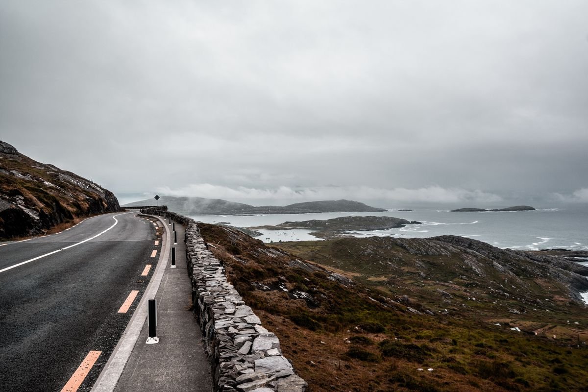 A coastal road above the sea on the Causeway Coastal Route