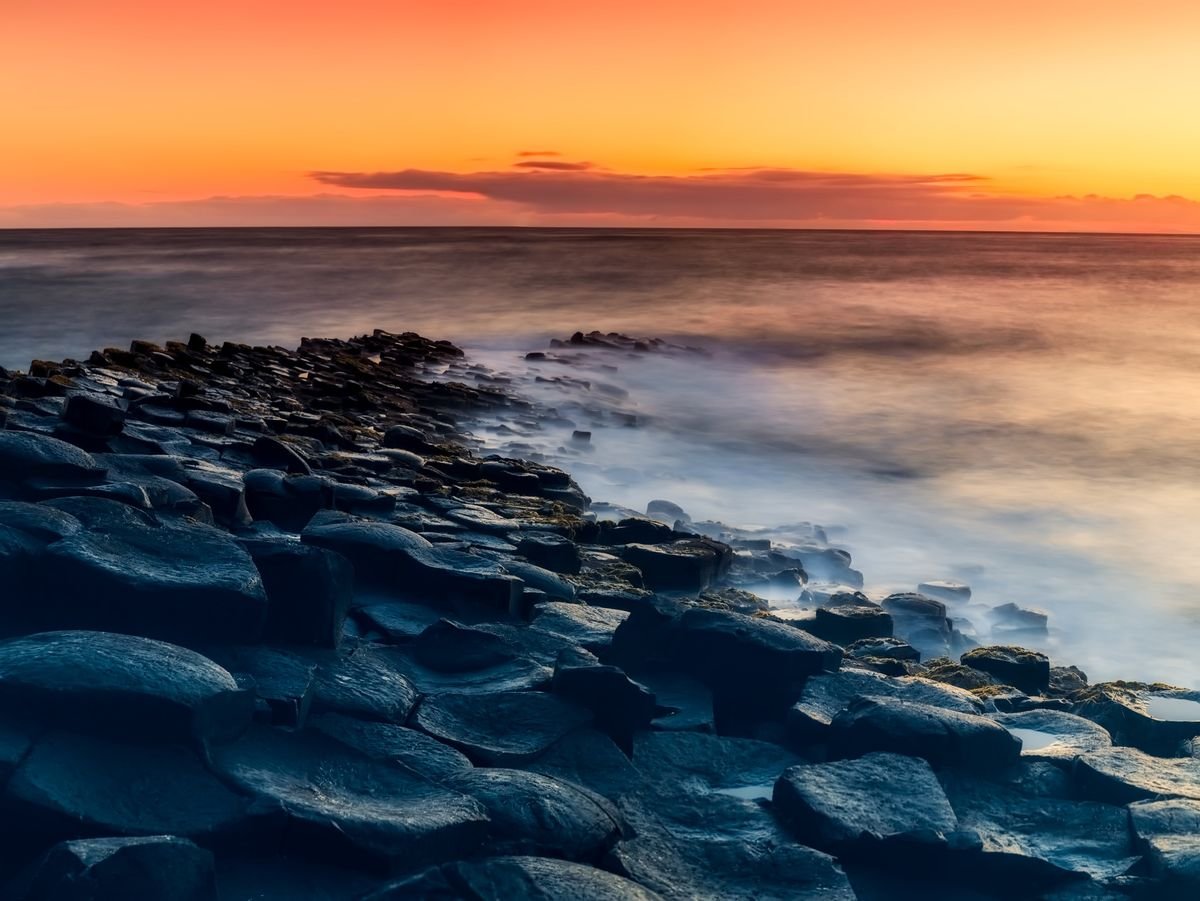 Sunset over the basalt stones of the Giant's Causeway