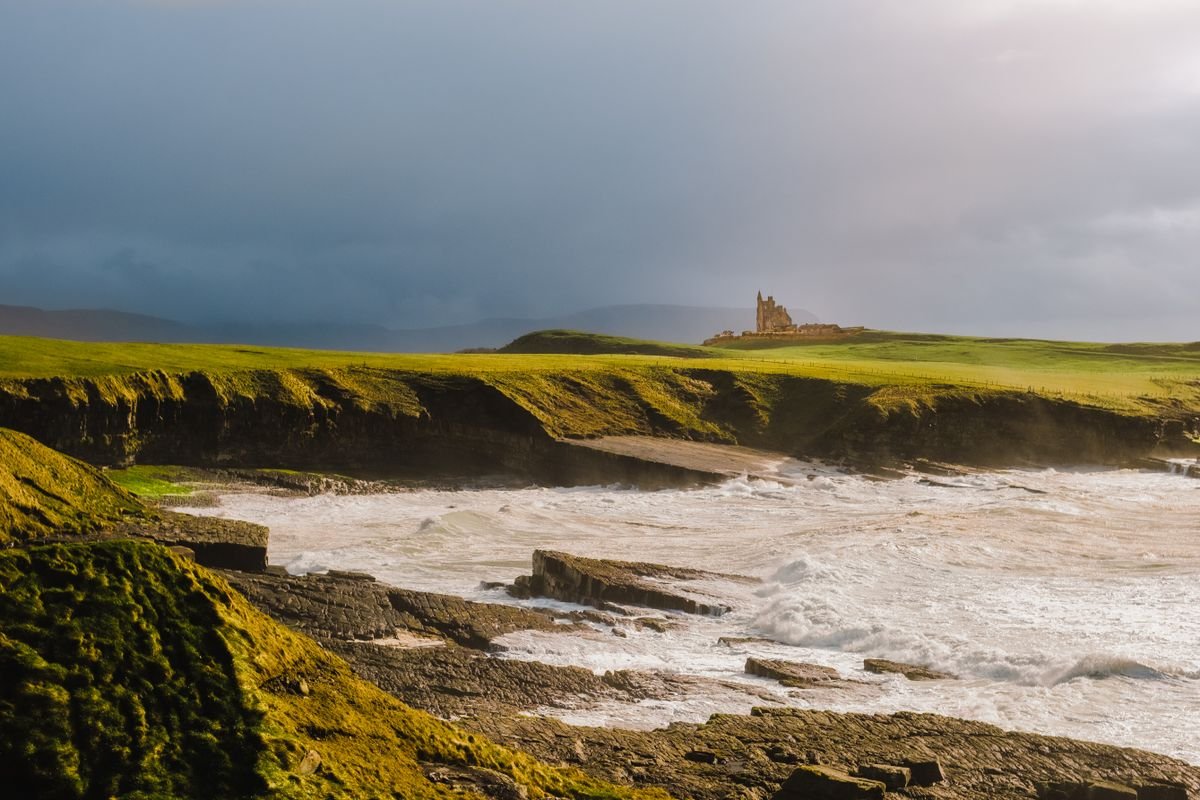 Classiebawn Castle above wild surf at Mullaghmore Head in County Sligo