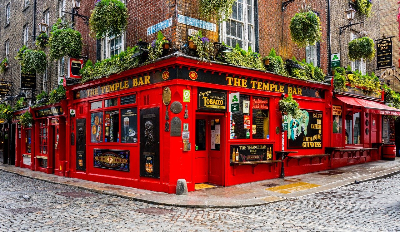 The red Temple Bar pub on a cobbled corner in Dublin