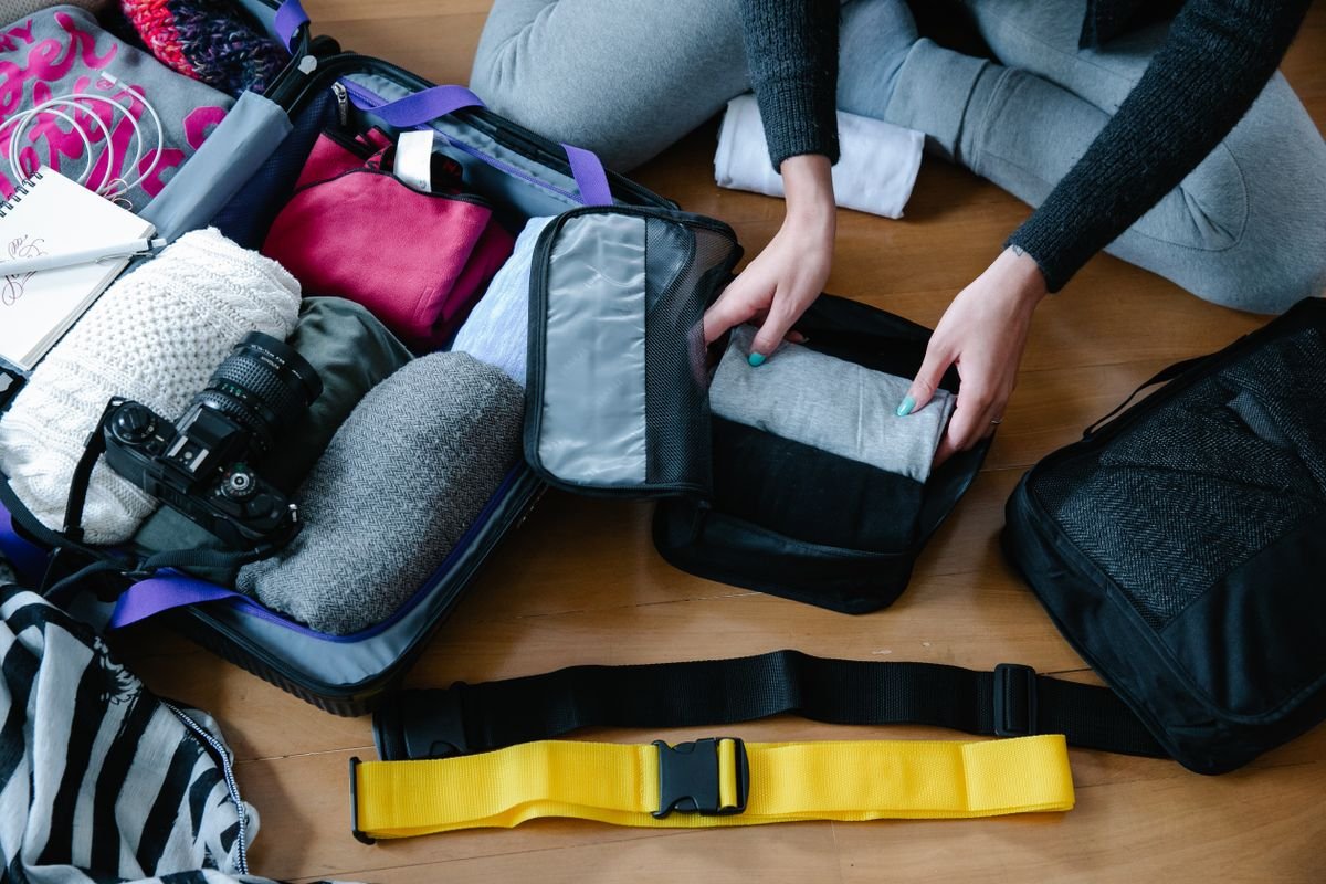 Packing cubes and clothes organized in a suitcase