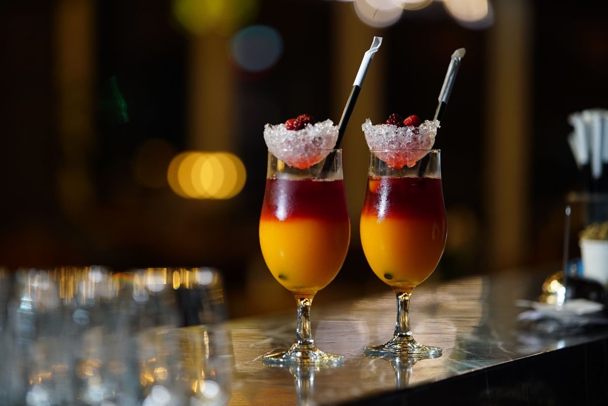 Two cocktails on a bar counter at a Killarney pub