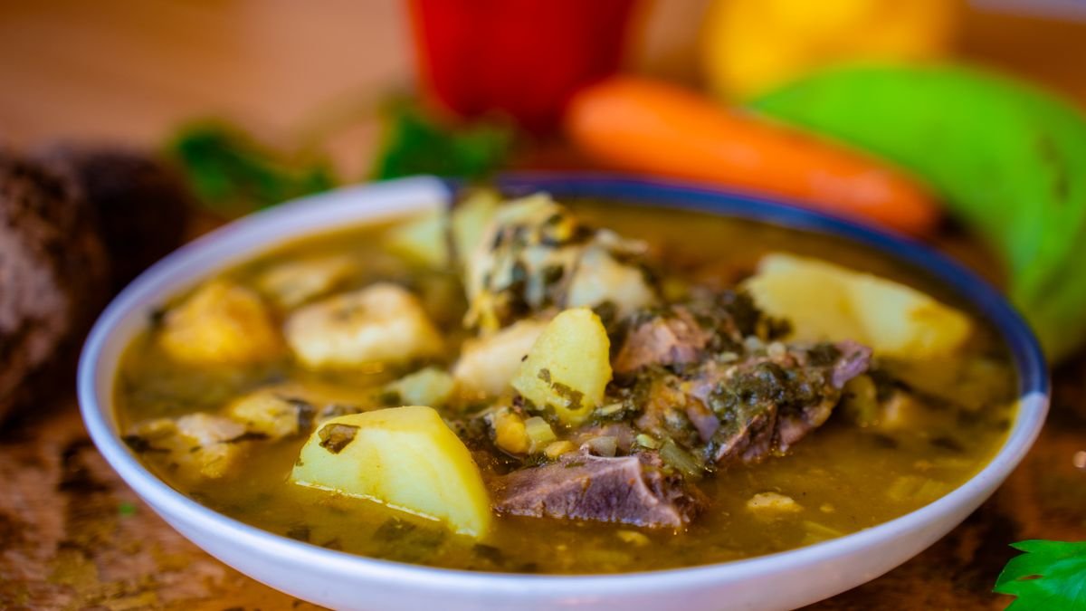 A bowl of Irish stew with beef and potatoes