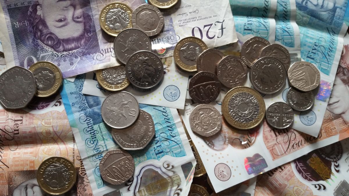 British pound sterling notes and coins for Carrick-a-Rede ticket prices
