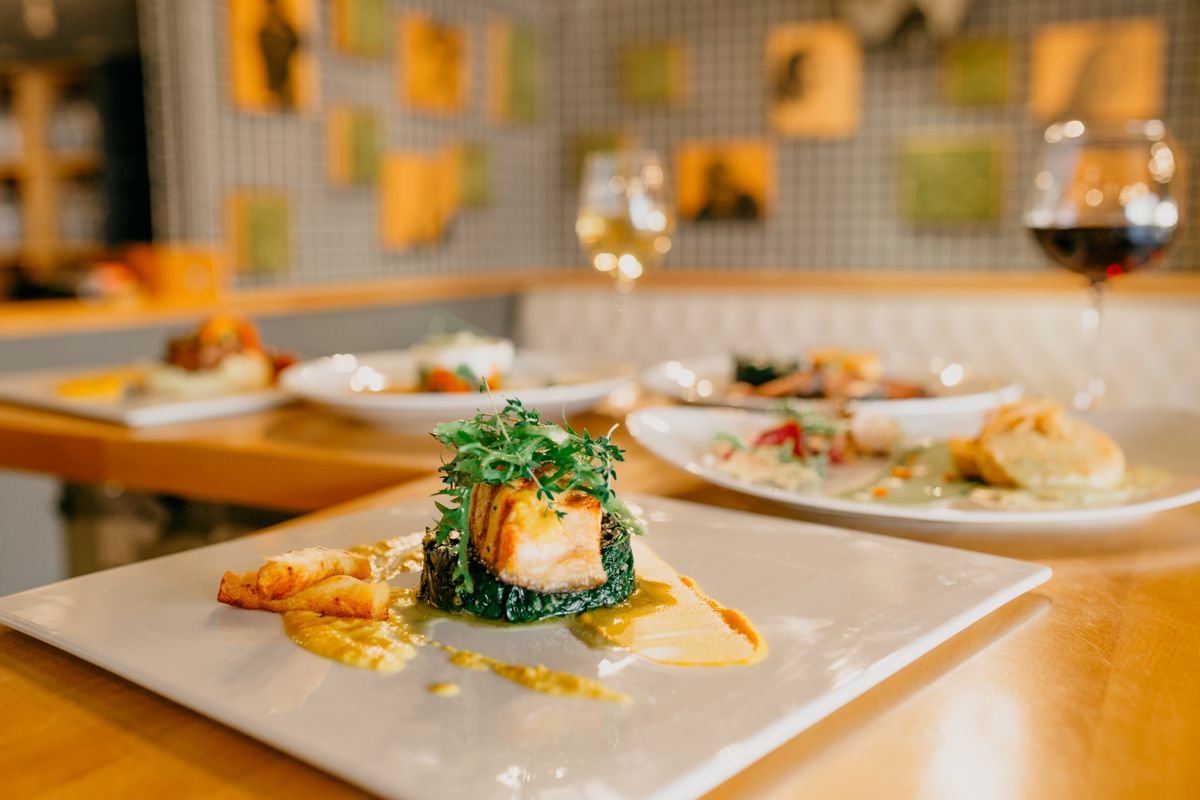 Plated modern Irish dinner with wine at a Cork restaurant