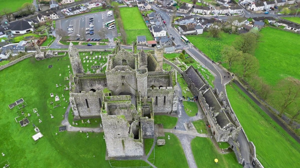 A close aerial view of the ruins and graveyard at the Rock of Cashel