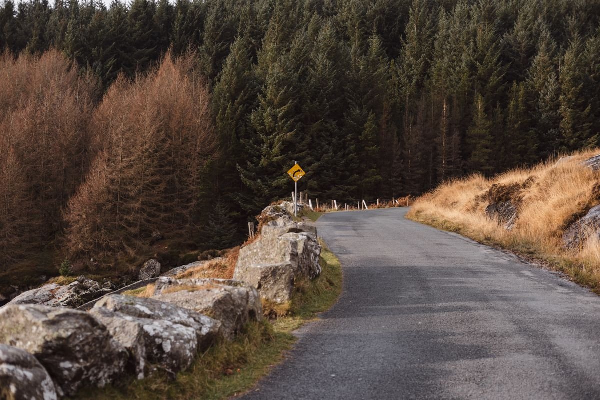 Narrow Kerry back road lined with stone walls