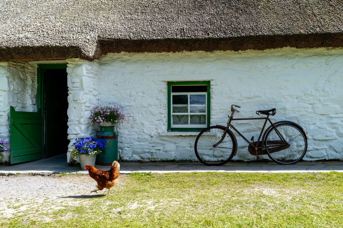 A thatched Irish cottage with a green door, near Cahir
