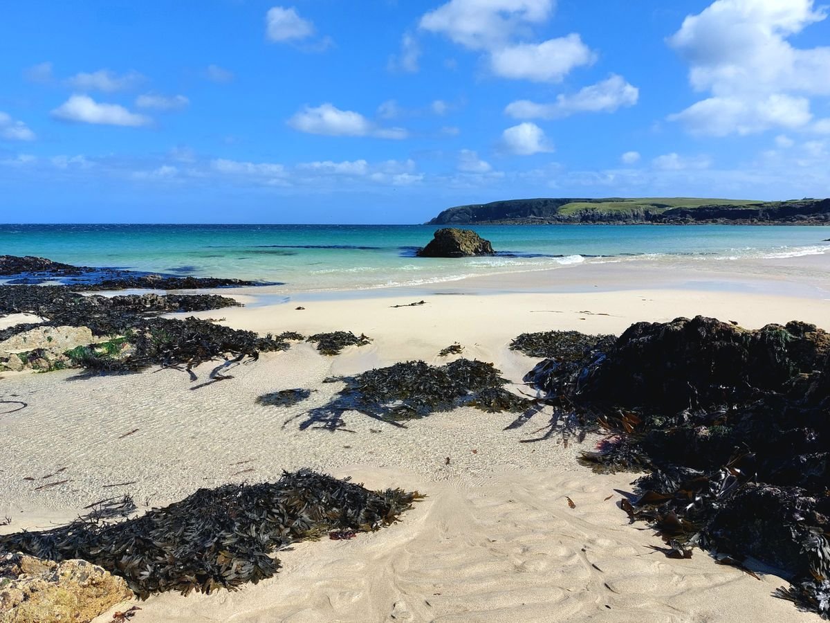 Sunny Mayo cove with turquoise water, white sand and a blue sky on a good-weather day