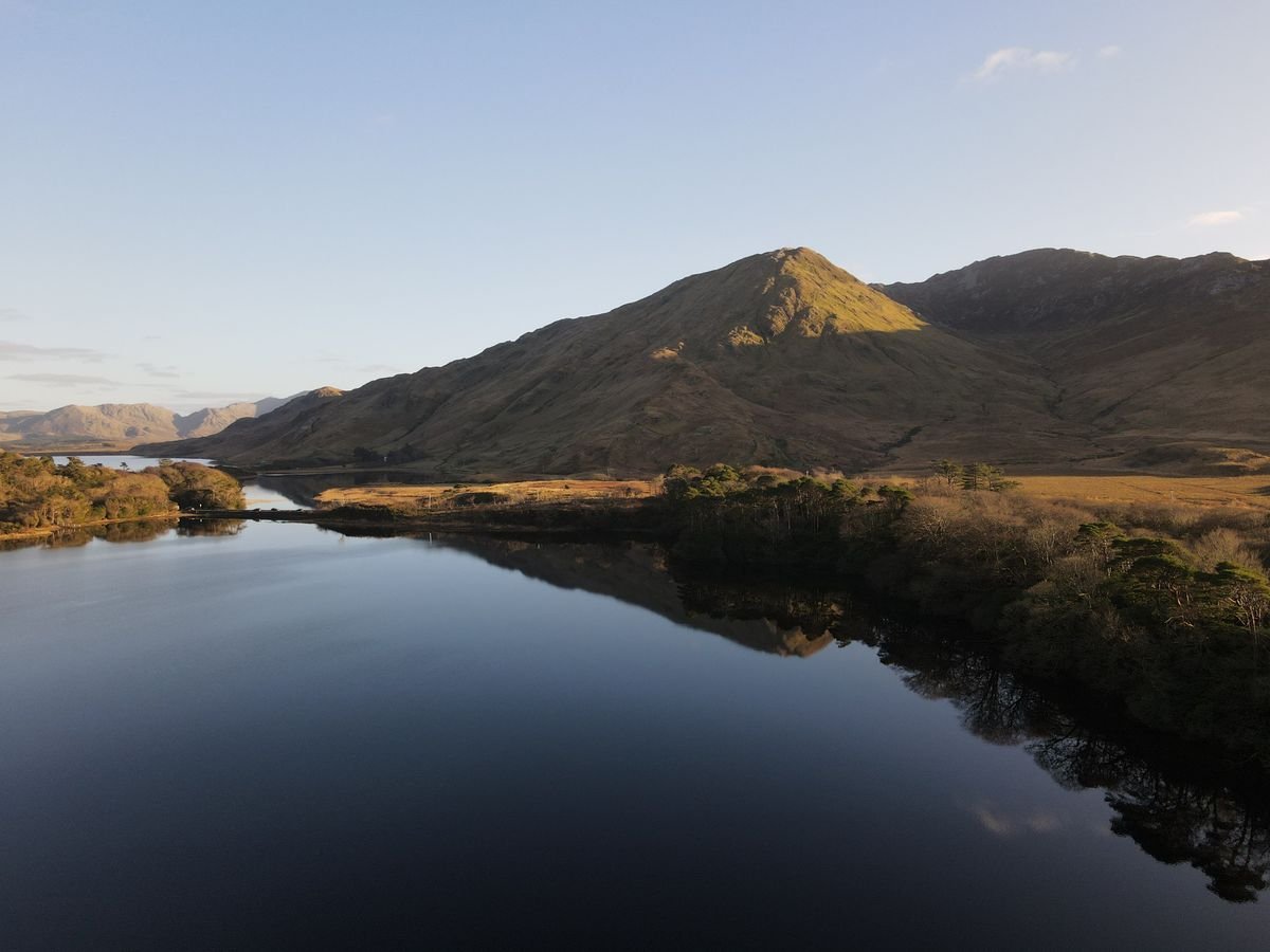 Lake and mountains with a still reflection