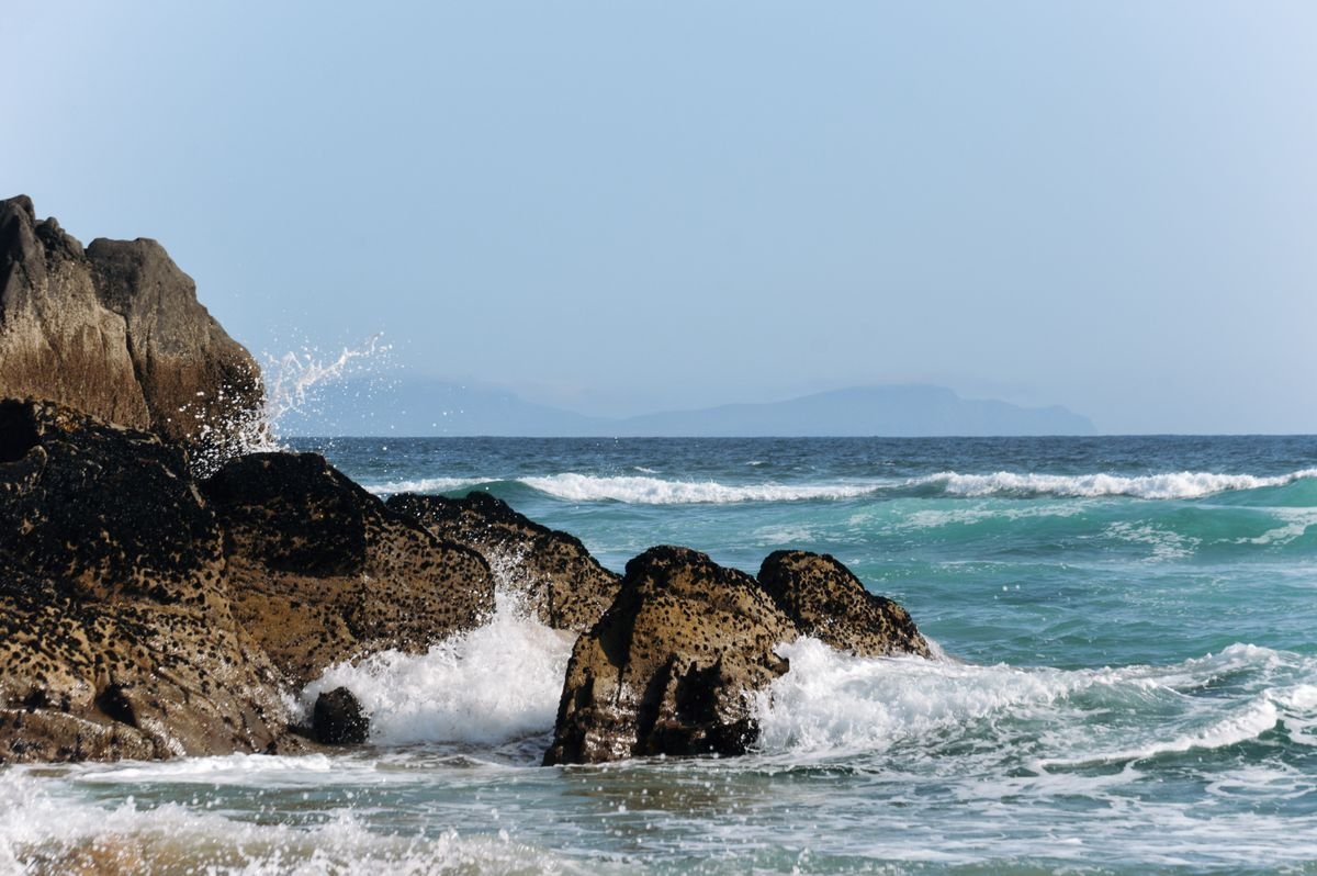 Waves breaking on rocks along the cold Atlantic coast of Mayo