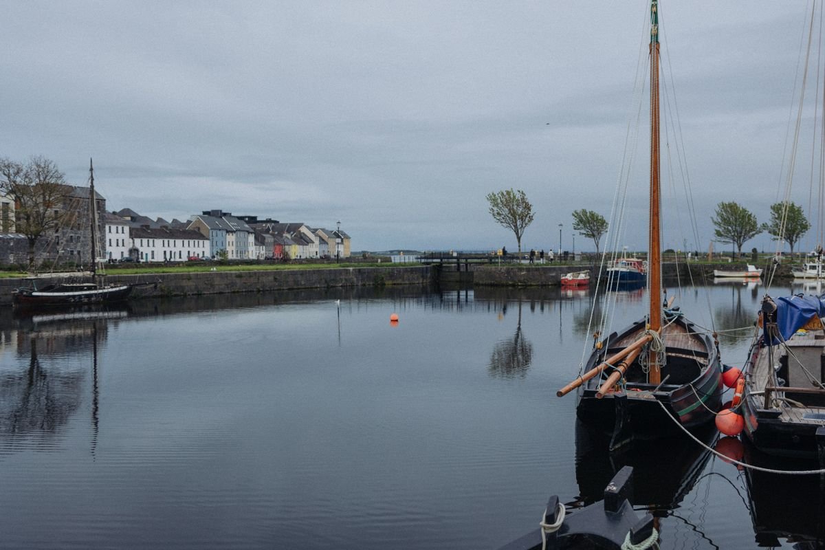 Traditional Galway Hooker boats moored in the harbour at the Claddagh