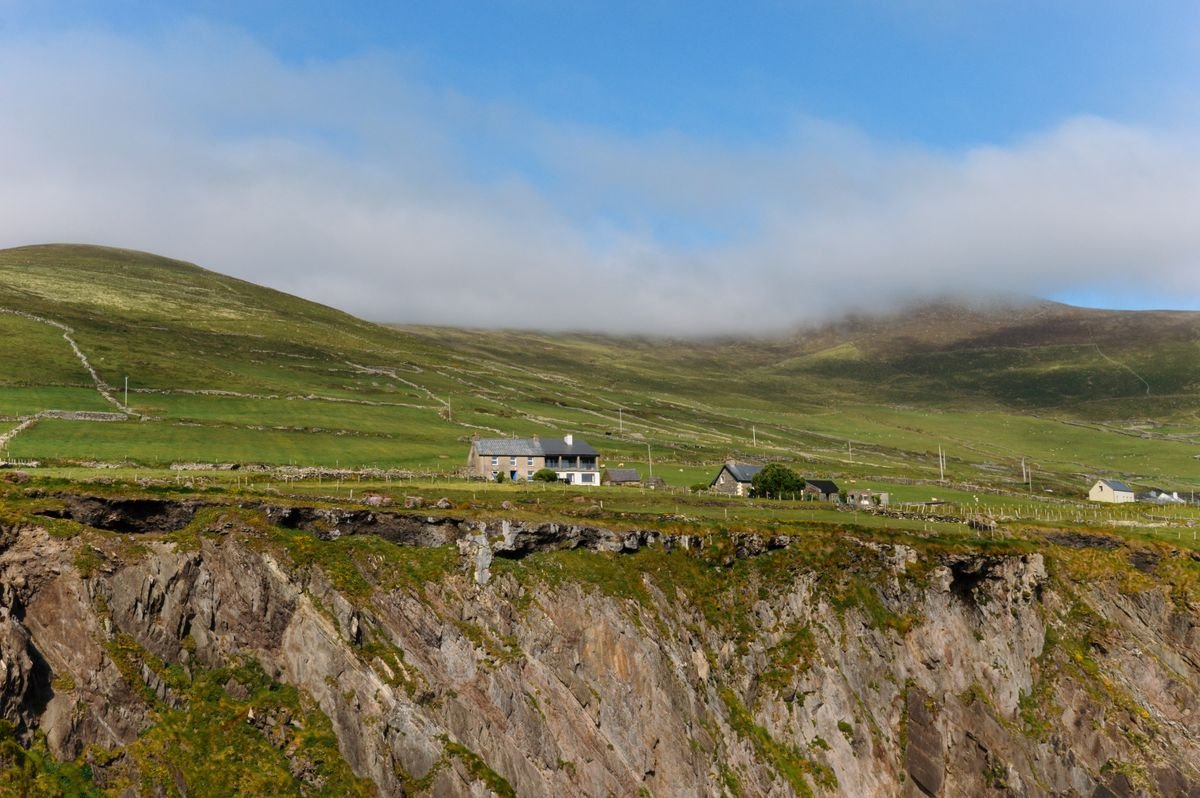 Cliffs and cottages along the Skellig Ring coast