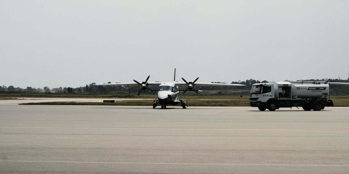 Small turboprop aircraft on the apron at a regional airport