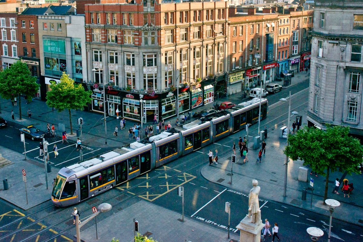 Luas tram crossing a busy Dublin street