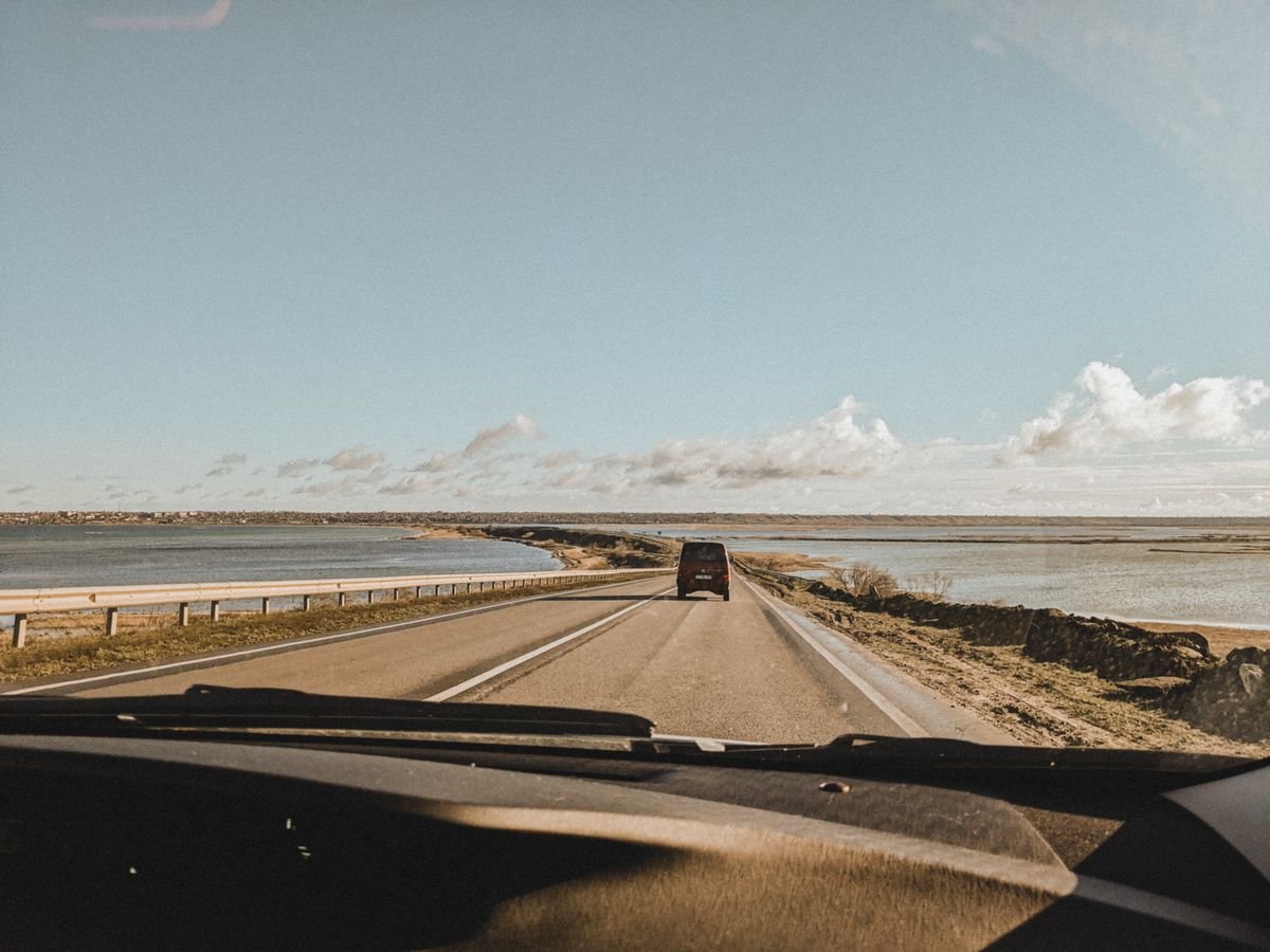 Coastal causeway road running between water on the Mullet Peninsula in Mayo